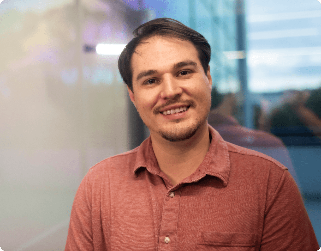 Manuel Castro standing in an Altos Labs office